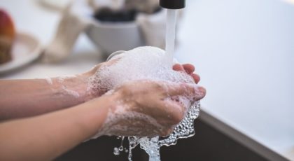 person washing his hand